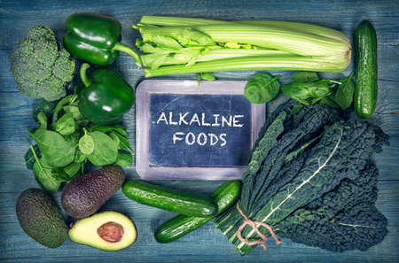 Alkaline foods above the wooden backgroundの写真素材