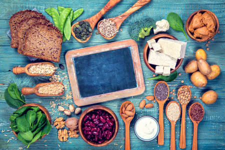 Vegan protein sources. Top view on a blue wooden backgroundの写真素材
