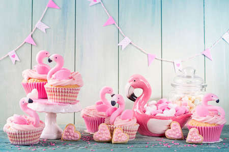 Flamingo cup cakes and cookies for partyの写真素材
