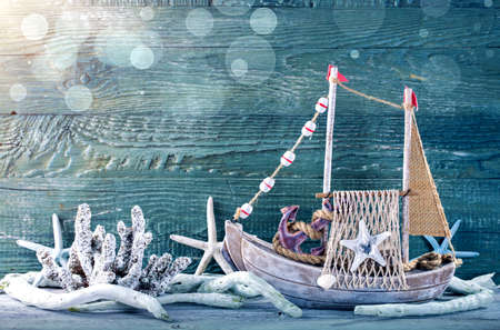 Marine life decoration on a green shabby backgroundの写真素材