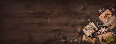 Christmas vintage gifts on a wooden backgroundの写真素材