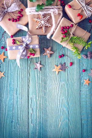 Christmas vintage gifts on a wooden backgroundの写真素材