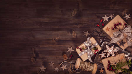 Christmas vintage gifts on a wooden backgroundの写真素材