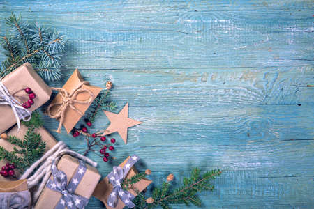 Christmas vintage gifts on a wooden backgroundの写真素材
