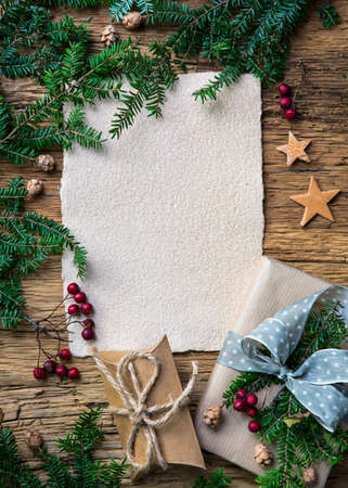 Old parchment for your wishes on a wooden backgroundの写真素材