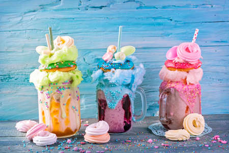 Freakshakes with donuts and candy flossの写真素材