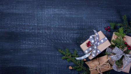Christmas vintage gifts on a wooden backgroundの写真素材