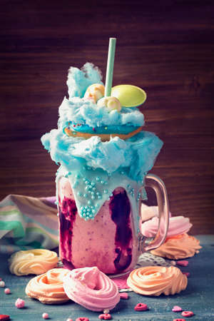 Blueberry freakshake with donuts and candy flossの写真素材