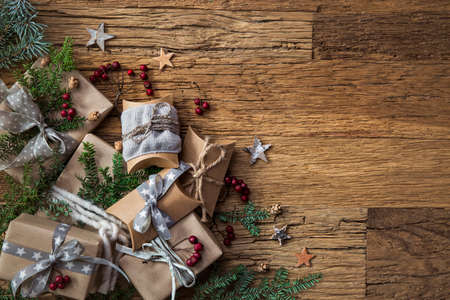 Christmas vintage gifts on a wooden backgroundの写真素材