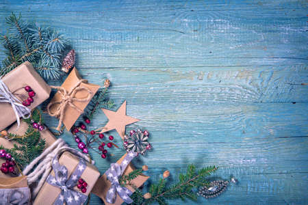 Christmas vintage gifts on a wooden backgroundの写真素材