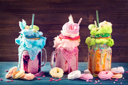 Freakshakes with donuts and candy flossの写真素材