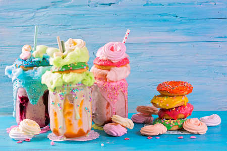 Freakshakes with donuts and candy flossの写真素材