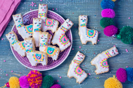 Llama cookies on a wooden backgroundの写真素材