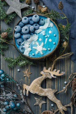 Blue spirulina smoothie bowl with blueberryの写真素材