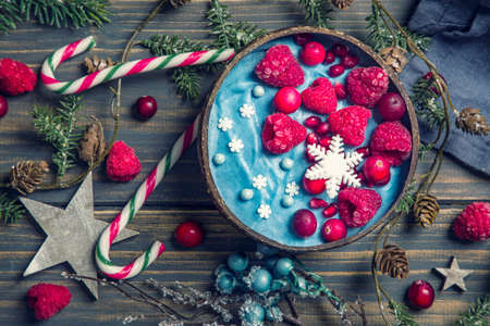 Blue spirulina smoothie bowl with rasberry and pomegranateの写真素材