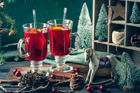 Winter hot drink with oranges and cranberriesの写真素材