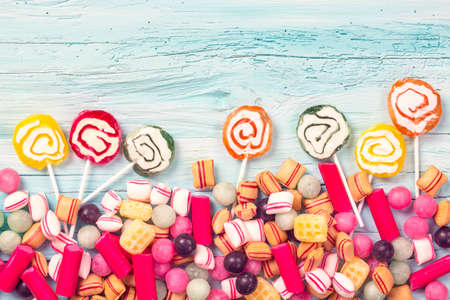 Pastel colored sweets isolated on white backgroundの写真素材