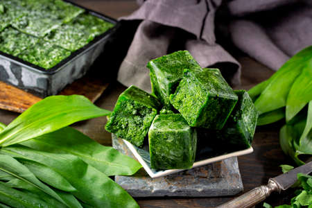 Freeze wild garlic in ice cube traysの写真素材