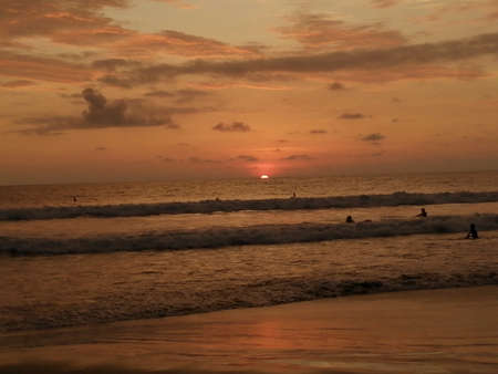 Sunset at the beach in Kovalam, Kerala, Indiaの写真素材