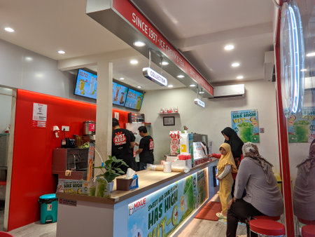 Bekasi, Indonesia - June 24, 2023: Customers waiting for orders at Mixue Ice Creamのeditorial素材