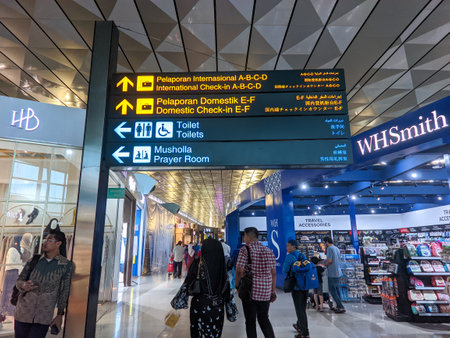 Jakarta, Indonesia - April 19, 2023 : Community activities in the departure hall of terminal 3, Soekarno-Hatta Airport, Jakarta, Indonesia.のeditorial素材