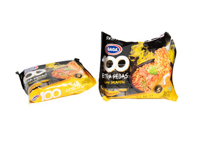 Jakarta, Indonesia - September 2, 2023: Two packs of Gaga instant noodle soup with jalapeno flavor on a white isolated background. Selective focusのeditorial素材