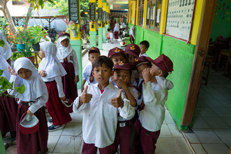 Banten, Indonesia - 18 Desember 2023 : group portrait of Indonesian elementary school.のeditorial素材