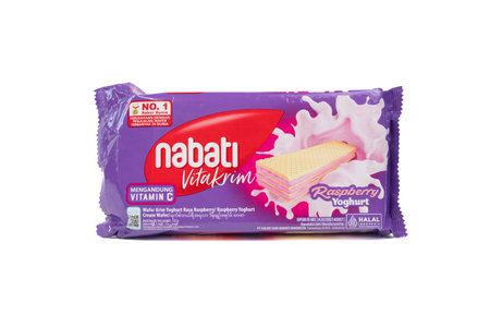 Jakarta, Indonesia - February 17, 2024: Raspberry flavored nabati wafer biscuits, isolated on white background. Selective focus, soft focusのeditorial素材