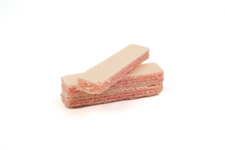 Raspberry flavored wafer biscuits, isolated on white background. Selective focus, soft focusの写真素材