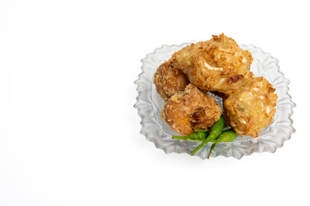 Bakwan is a fried food made from vegetables and flour. Bakwan is a typical Indonesian street snack.