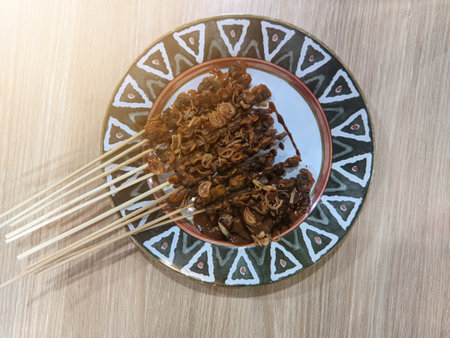 Scallop satay is a typical Indonesian food, especially from the city of Surabaya. Made from boiled meat and served on skewers.の写真素材