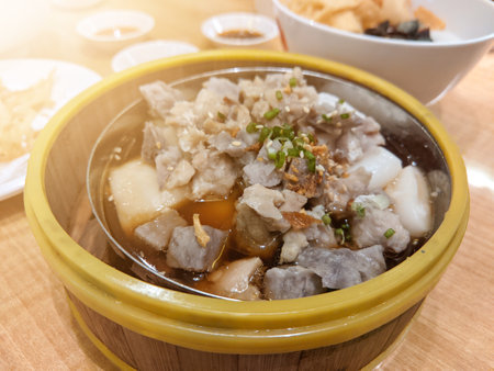 Chongfen chicken tao si served in a plate on a wooden tableの写真素材