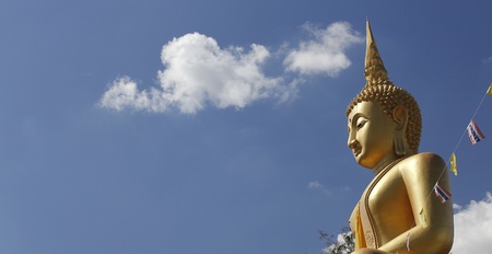 Buddha statue with blue sky in the background, Thailand のeditorial素材