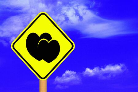 Road sign with Hearts, blue sky の写真素材