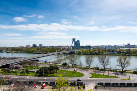 Bratislava, Slovakia - April 14, 2018: The SNP bridge through Danude river aerial view in Bratislava, Slovakia. Panoramic view of capital Slovakia city.のeditorial素材