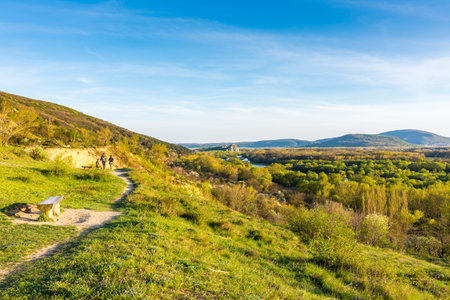 View of Devin castle from Sandberg hill. Beautiful spring evening with green grass and blue sky. Look to old historical fortress.のeditorial素材
