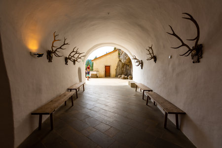 Predjama, Slovenia - 22.07.2018: Interior of medieval Predjama castle near the Postojna cave. Slovenia fortress and inner decorationsのeditorial素材