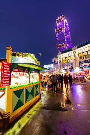 Vienna, Austria - 1.12.2018: Vienna prater park, Austria. Night scene from the famous tourist destination. Funny atraction, big Vienna wheel and giant roller coaster.のeditorial素材