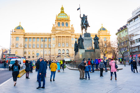 PRAGUE, CZECH REPUBLIC - 1.12.2018: The Wenceslas square (Vaclavske namesti in czech) statue near the national museum historical building. Old monument with tourist taking photos. National symbolのeditorial素材