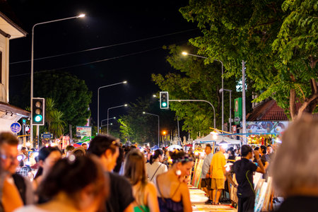 CHIANG MAI, THAILAND - 3.11.2019: View of night street with traffic lights during the night market...