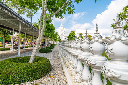 CHIANG RAI, THAILAND - 6.11.2019: The ornamental railing near Wat Rong Khun temple (White temple). Famous tourist destination in northern Thailand region. Religion buddhist building.のeditorial素材