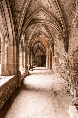 Ancient stone corridor at ruined monastery Rosa Coeli. Spiritual historic place near Dolni Kounice...