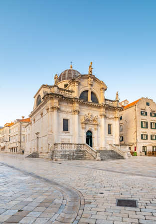 Square at St Blaise Church and people at Stradun Street in the Old city of Dubrovnik, Croatia. Summer morning with soft light.の写真素材