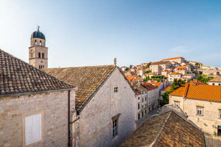Aerial panoramic view of the old city of Dubrovnik. Church tower and look to ancient buildings. Sunny day.の写真素材