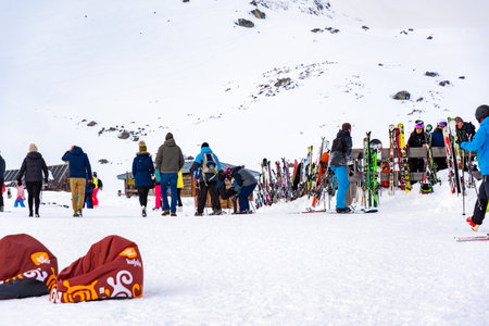 Tatranska Lomnica - 4.2.2022: Skiers and tourist at Skalnate Pleso mountain, High Tatras region, Slovakia. Near is the Lomnicky Stit peak. Winter sports.のeditorial素材