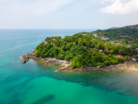 Aerial drone view of bamboo bay and beach at Koh Lanta island, Thailand. Tropical forest near the rocky beach and white sand with turquoise water.の写真素材