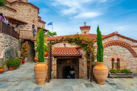 Meteora, Greece - 19.9.2023: People and tourists visit the Meteora monastery in Greece. Interior of...