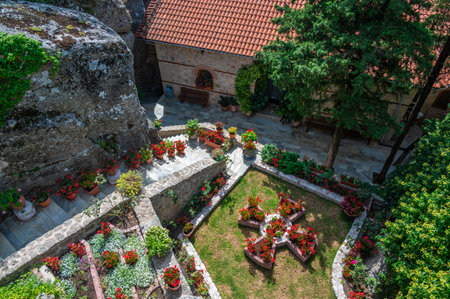 Meteora, Greece - 19.9.2023: People and tourists visit the Meteora monastery in Greece. Interior of...