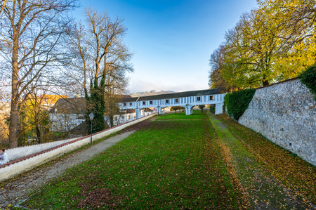 Covered bridge from Cesky Krumlov Castle leading into the park, arching over a narrow alley. The historic structure adds a touch of charm to the peaceful surroundingsの写真素材