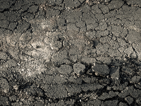 ground cracked on the road.の写真素材